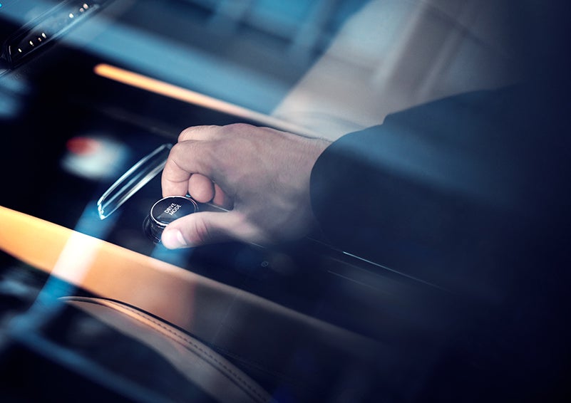 The driver of a 2023 Lincoln Corsair® SUV is shown adjusting the drive mode. | Doggett Lincoln of Beaumont in Beaumont TX