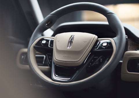 The intuitively placed controls of the steering wheel on a 2024 Lincoln Aviator® SUV | Doggett Lincoln of Beaumont in Beaumont TX
