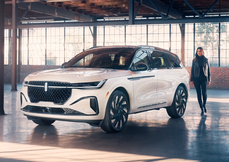 A person approaches a 2024 Lincoln Nautilus® SUV. | Doggett Lincoln of Beaumont in Beaumont TX