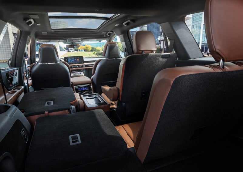 The interior of the 2025 Lincoln Aviator® SUV is shown with two seats folded down for added space. | Doggett Lincoln of Beaumont in Beaumont TX