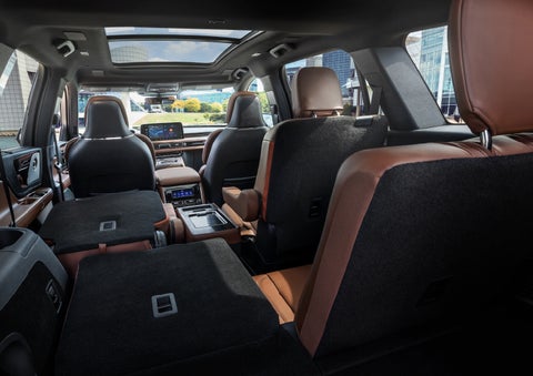 The interior of the 2025 Lincoln Aviator® SUV is shown with two seats folded down for added space. | Doggett Lincoln of Beaumont in Beaumont TX