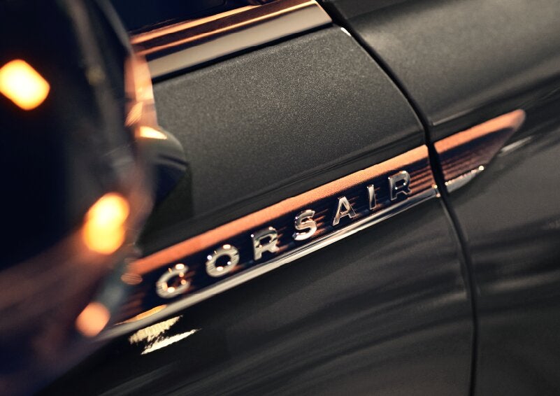 The stylish chrome badge reading “CORSAIR” is shown on the exterior of the vehicle. | Doggett Lincoln of Beaumont in Beaumont TX