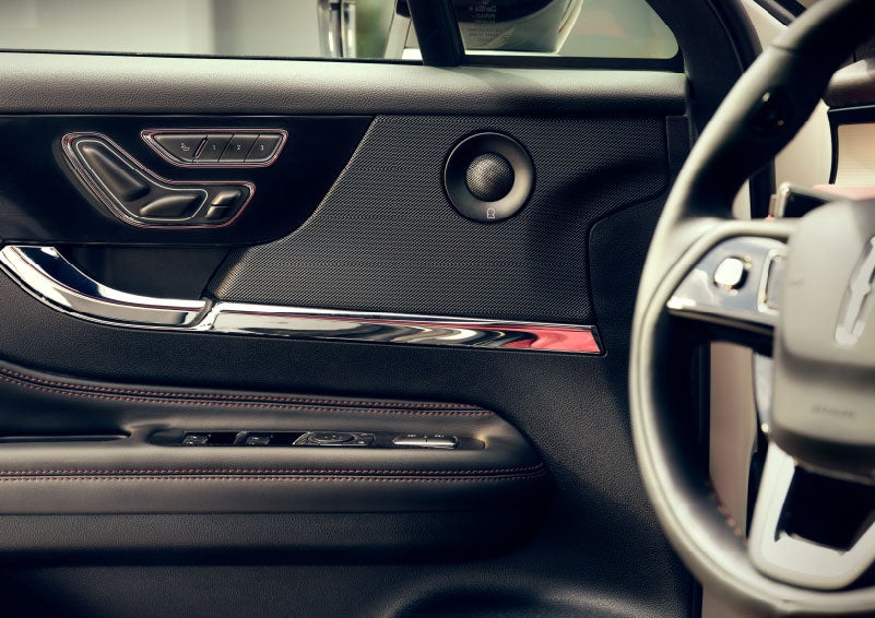 An audio speaker is shown in the driver's side door of a 2024 Lincoln Corsair® SUV. | Doggett Lincoln of Beaumont in Beaumont TX