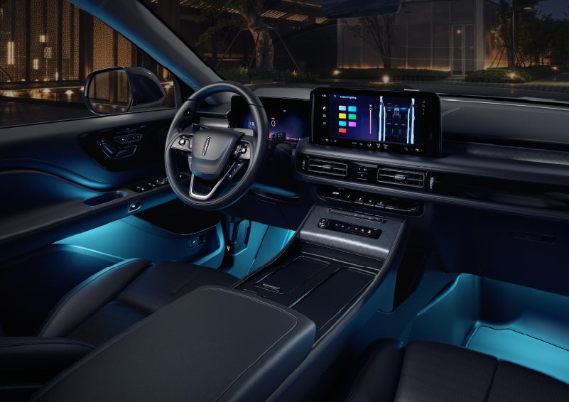 Deep blue ambient lighting glows from various places within a 2026 Lincoln Aviator® SUV. | Doggett Lincoln of Beaumont in Beaumont TX