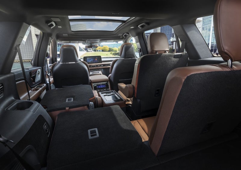 One side of the PowerFold® third-row seat and a second-row seat are folded forward in the 2026 Lincoln Aviator® SUV. | Doggett Lincoln of Beaumont in Beaumont TX