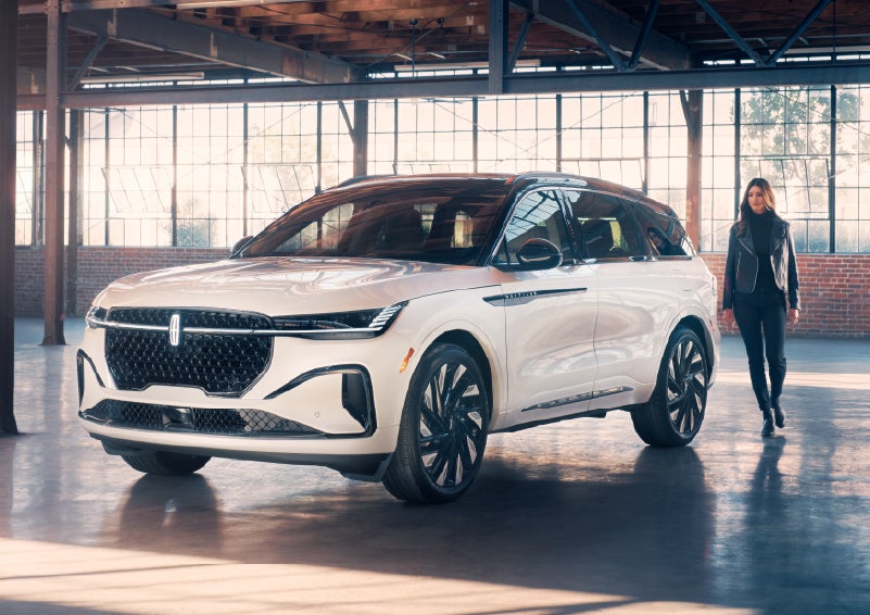 A person approaches a 2026 Lincoln Nautilus® SUV. | Doggett Lincoln of Beaumont in Beaumont TX