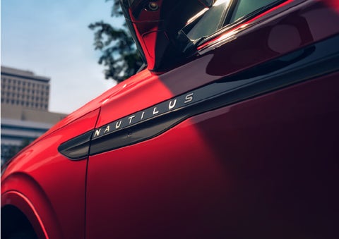 A side badge on the passenger door reads Nautilus. | Doggett Lincoln of Beaumont in Beaumont TX